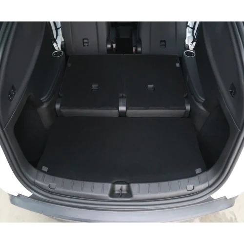 SUV rear cargo area with rear seats folded flat to form a large loading floor