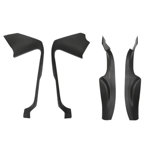 Set of four black automotive body parts or trim pieces laid out on a white background, likely exterior panels or aero components.