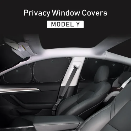Tesla Model Y interior with privacy window covers installed on rear side windows.