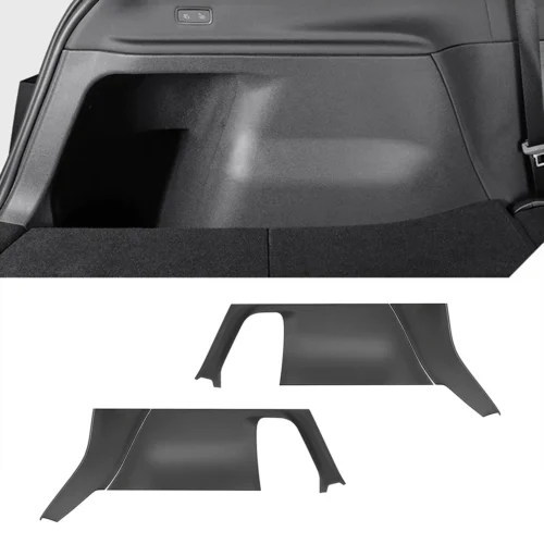 Close-up of a car trunk interior with replacement plastic side panels; two gray trim pieces shown below for installation