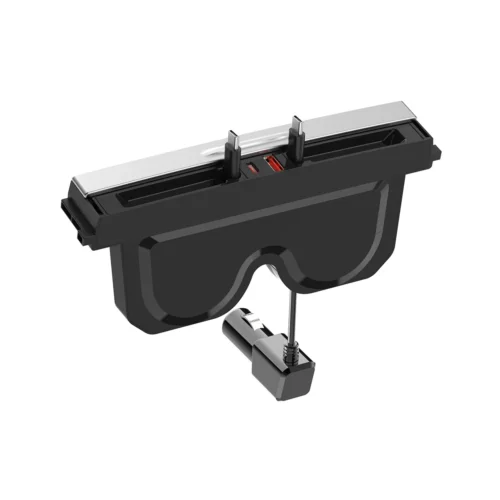 3D rendering of a black virtual reality headset with a detachable USB‑style connector and a small clamp accessory beneath it.