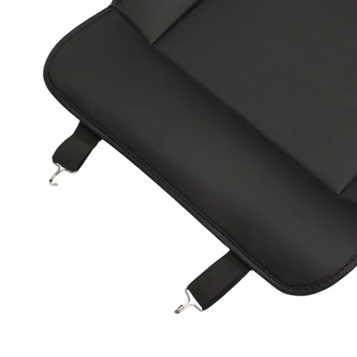 Close-up of a black padded bag edge with two fabric loops and silver metal hooks for attachment.